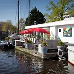 Modern Houseboat Apartment In Amsterdam With Terrace