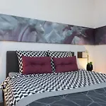 L\'Home Apartment