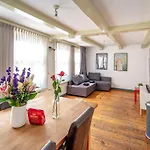 Spacious Central City Apartment With Big Private Sundeck!