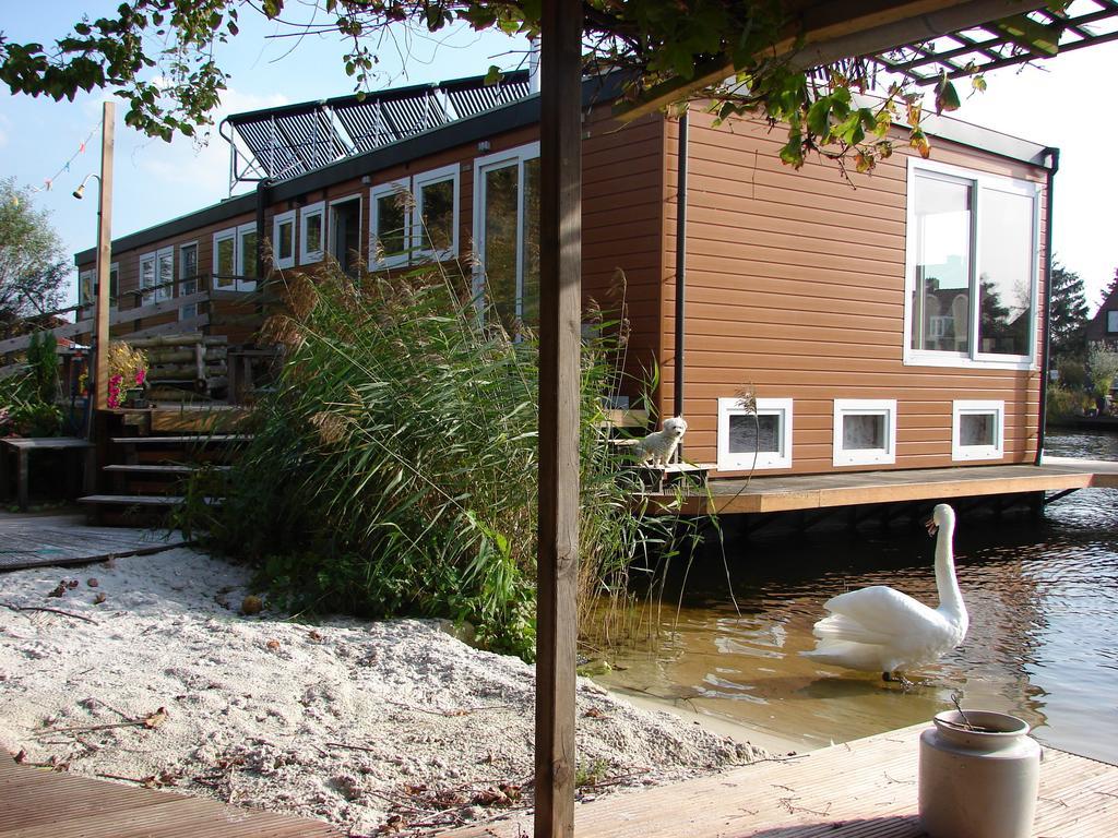 Houseboat Between Windmills