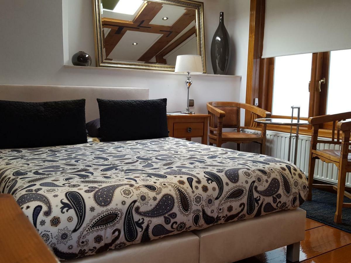 Couette-café Suites Aan De Singel 3*